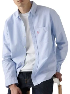 Chemise en coton ciel à coupe droite pourvue d'un col à revers
