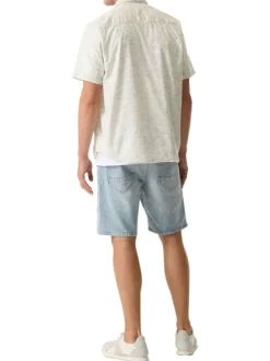Chemise en coton écrue à imprimé floral avec une coupe droite