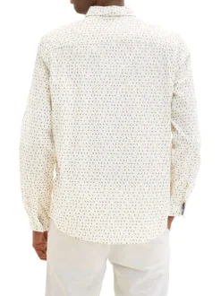 Chemise en coton écrue à pois avec une coupe droite et un col italien