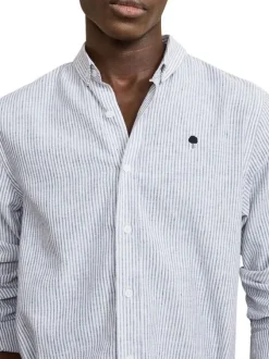 Chemise en coton et lin mélangé bleue à rayures avec un col américain