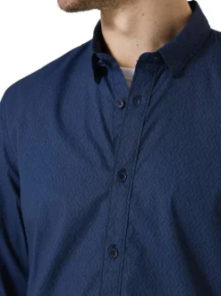 Chemise en coton marine avec fermeture boutonnée et motif géométrique