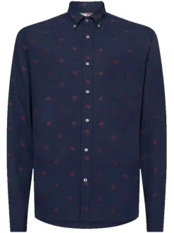 Chemise en coton marine avec une coupe slim col américain et motif monogramme