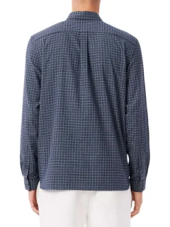 Chemise en coton marine à carreaux avec un col à rabats et des manches longues