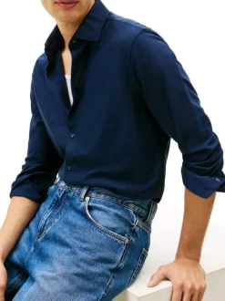 Chemise en coton marine à coupe droite pourvue d'un col à revers