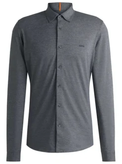 Chemise en coton marine unie avec boutonnière nacrée et logo brodé