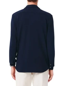 Chemise en coton marine unie avec un col à rabats et des manches longues