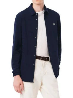 Chemise en coton marine unie avec un col à rabats et des manches longues