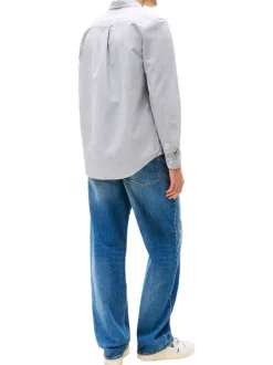 Chemise en coton marine unie avec une coupe droite et un col chemise