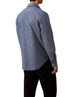 Chemise en coton marine unie avec une coupe droite et un col à revers