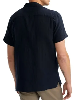 Chemise en coton marine unie pourvue d'un col cubain et d'une coupe droite