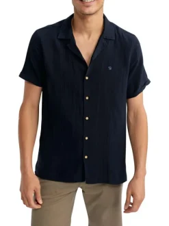 Chemise en coton marine unie pourvue d'un col cubain et d'une coupe droite