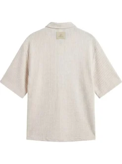 Chemise en coton mélangé écrue unie pourvue d'un col chemise