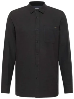 Chemise en coton noire avec un col chemise et poche sur la poitrine