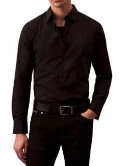 Chemise en coton noire unie à coupe regular fit fermée par des boutons