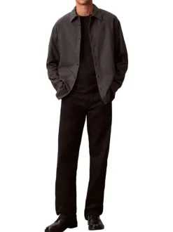 Chemise en coton noir unie coupe droite avec un col à revers