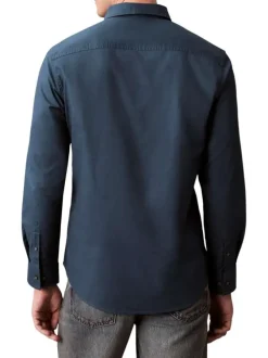 Chemise en coton nuit unie avec une coupe droite et un col à revers