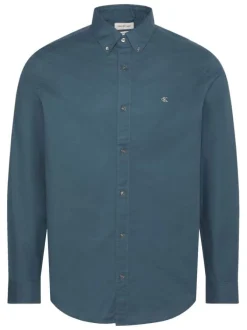 Chemise en coton nuit unie avec une coupe droite et un col à revers