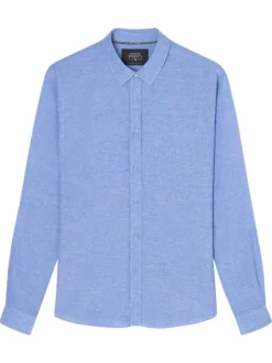 Chemise en lin bleue unie avec une coupe regular fit et des manches boutonnées