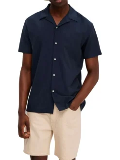 Chemise hawaïenne bleue marine unie à coupe droite avec un col ouvert à revers