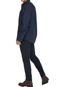Chemise indigo unie en coton avec une coupe droite et un col à revers