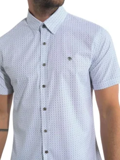 Chemise manches courtes beige imprimée avec une coupe droite et un col à revers