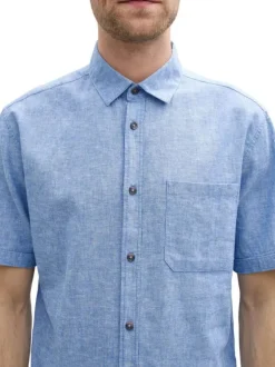 Chemise manches courtes bleue unie à coupe droite avec 1 poche et col français