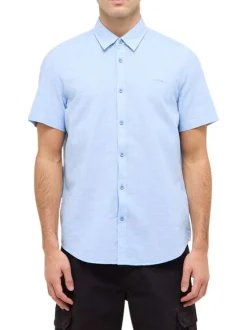 Chemise manches courtes en lin et coton bleue unie à coupe regular fit