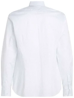 Chemise à manches longues en coton blanche à pois avec une coupe slim