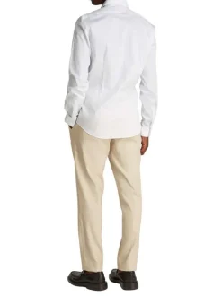 Chemise à manches longues en coton blanche à pois avec une coupe slim