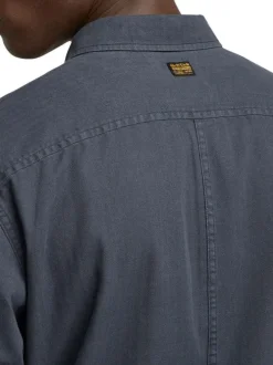 Chemise marine unie avec une col français et une coupe droite