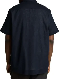 Chemise marine unie pourvue de manches courtes et d'un col français