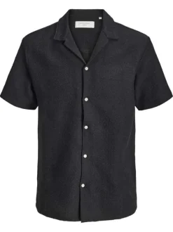 Chemise noire en crochet pourvue d'un col cubain et de manches courtes