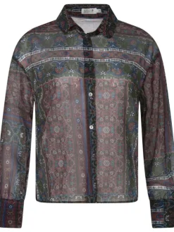 Chemise noire fleurie avec une coupe ample col italien et à manches longues