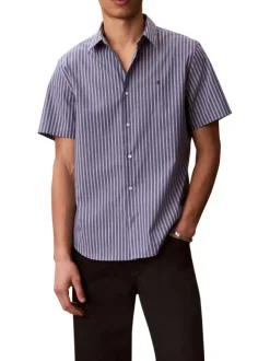 Chemise à rayures verticales en coton bleue pourvue d'un col à revers