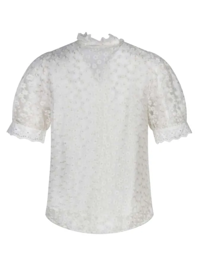 Chemisier beige avec des motifs fleuris à coupe droite et un col montant