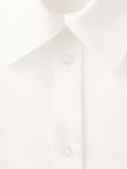 Chemisier beige uni avec une coupe droite et un col à revers