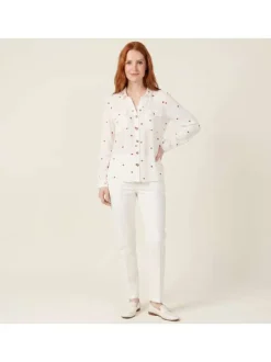Chemisier blanc à motifs avec un col à revers et des manches longues