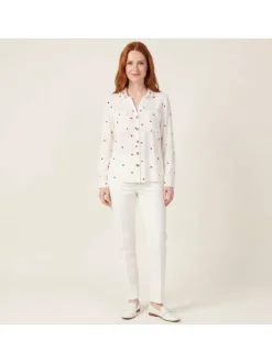 Chemisier blanc à motifs avec un col à revers et des manches longues