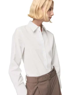 Chemisier blanc uni avec un col à revers et des manches longues