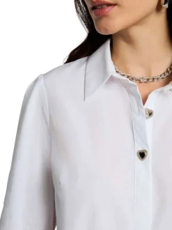 Chemisier blanc uni avec une coupe droite et un col à revers