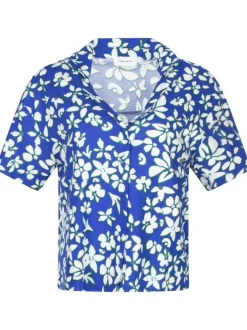 Chemisier bleu électrique fleuri avec une coupe droite et un col cranté