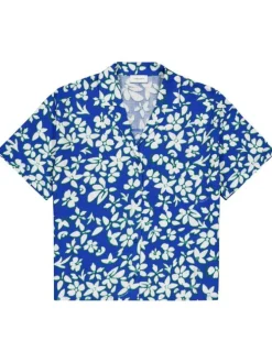 Chemisier bleu électrique fleuri avec une coupe droite et un col cranté