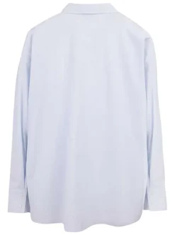 Chemisier bleu à motifs brodés avec une coupe droite et un col chemise