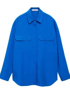 Chemisier bleu uni avec une coupe large un col français et à manches longues