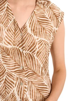 Chemisier camel à motifs floraux avec une coupe droite et un col chemise