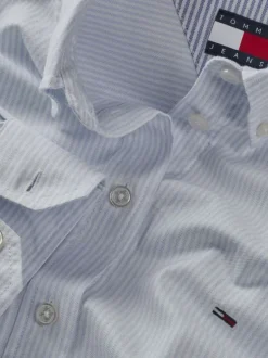 Chemisier ciel rayée en coton avec des boutons à l'avant et logo de la marque