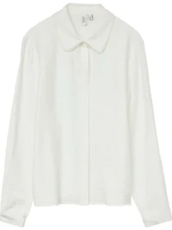 Chemisier écru uni avec un col chemise perlé et des manches longues