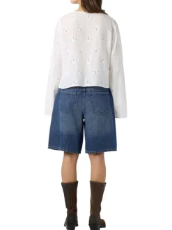 Chemisier en coton biologique blanc uni avec une coupe droite et d’un col en V