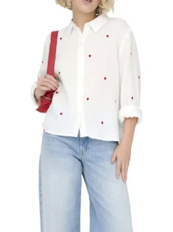 Chemisier en coton blanc à motifs coeurs avec une coupe droite et col à revers