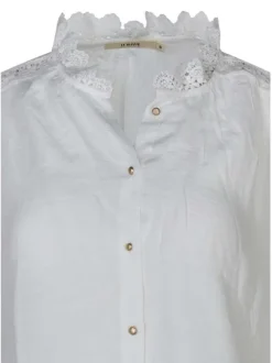 Chemisier en coton blanc uni avec des manches longues et une coupe droite